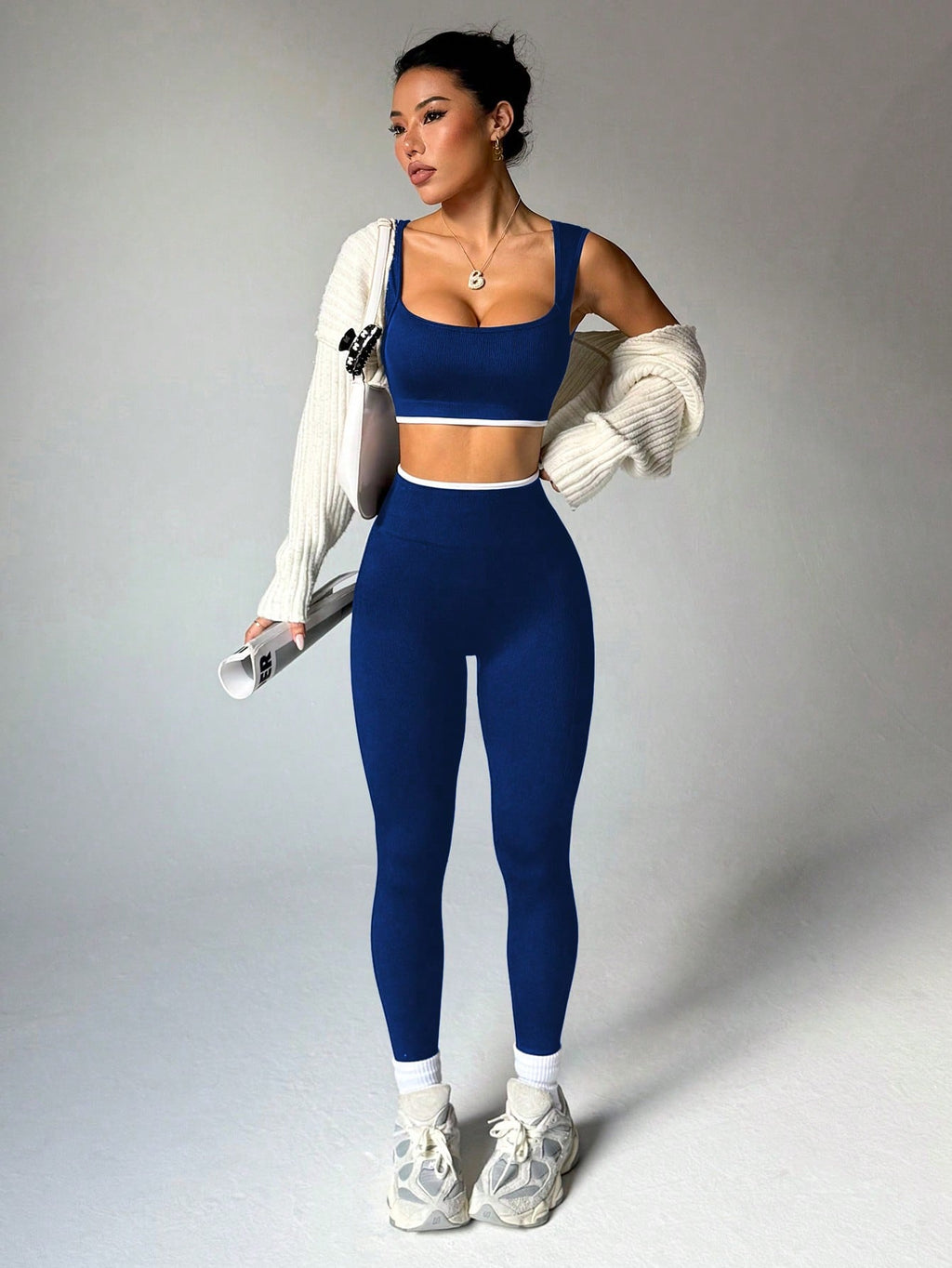 Dewbera Dewbera Conjunto Esportivo Feminino com Regata Cropped Listrada em Blocos de Cor e Legging