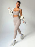 Dewbera Dewbera Conjunto Esportivo Feminino com Regata Cropped Listrada em Blocos de Cor e Legging